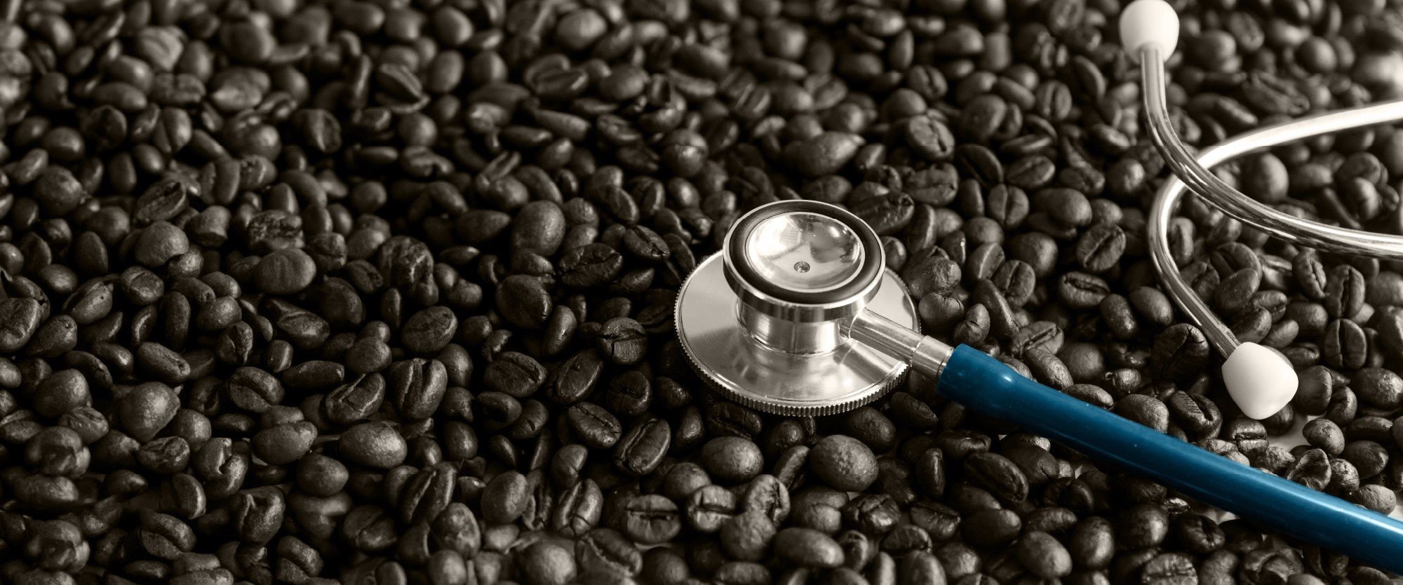 stethoscope over coffee beans